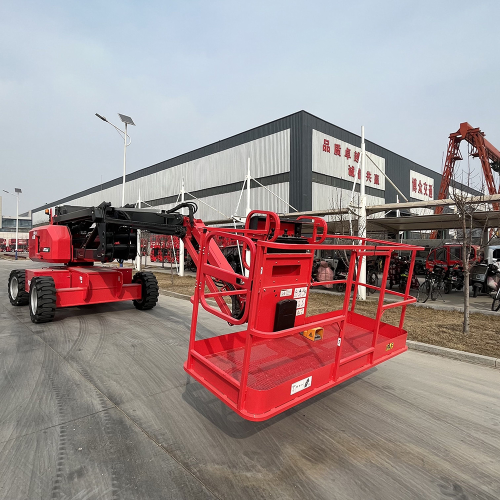 Red HERED HA21JE articulating boom lift in stowed position, rear view