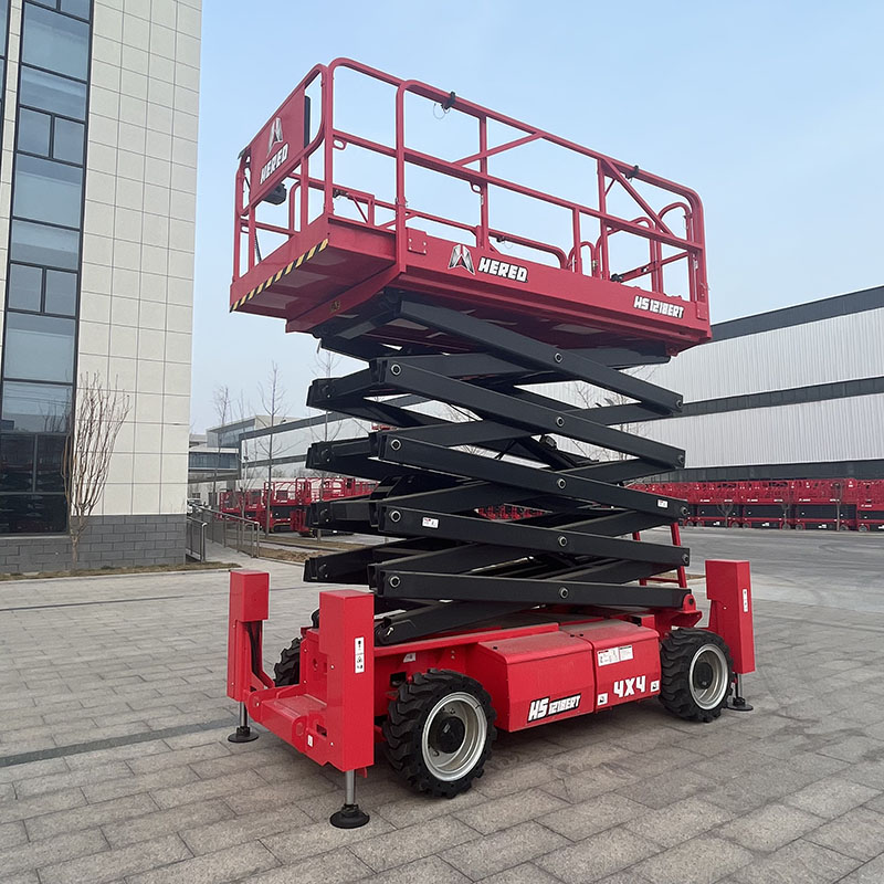 Red HERED HS1218ERT rough-terrain scissor lift with the platform raised
