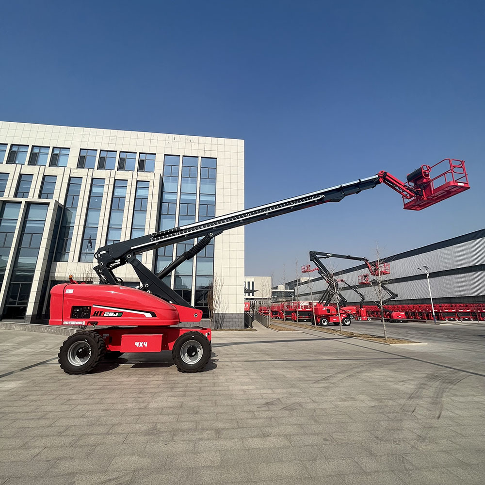 Red HERED HT26JE telescopic boom lift in stowed position
